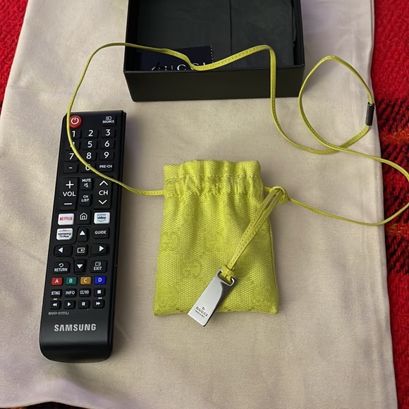 Gucci pouch preloved excellent condition color is yellow 100% Authentic. - Picture 9 of 9